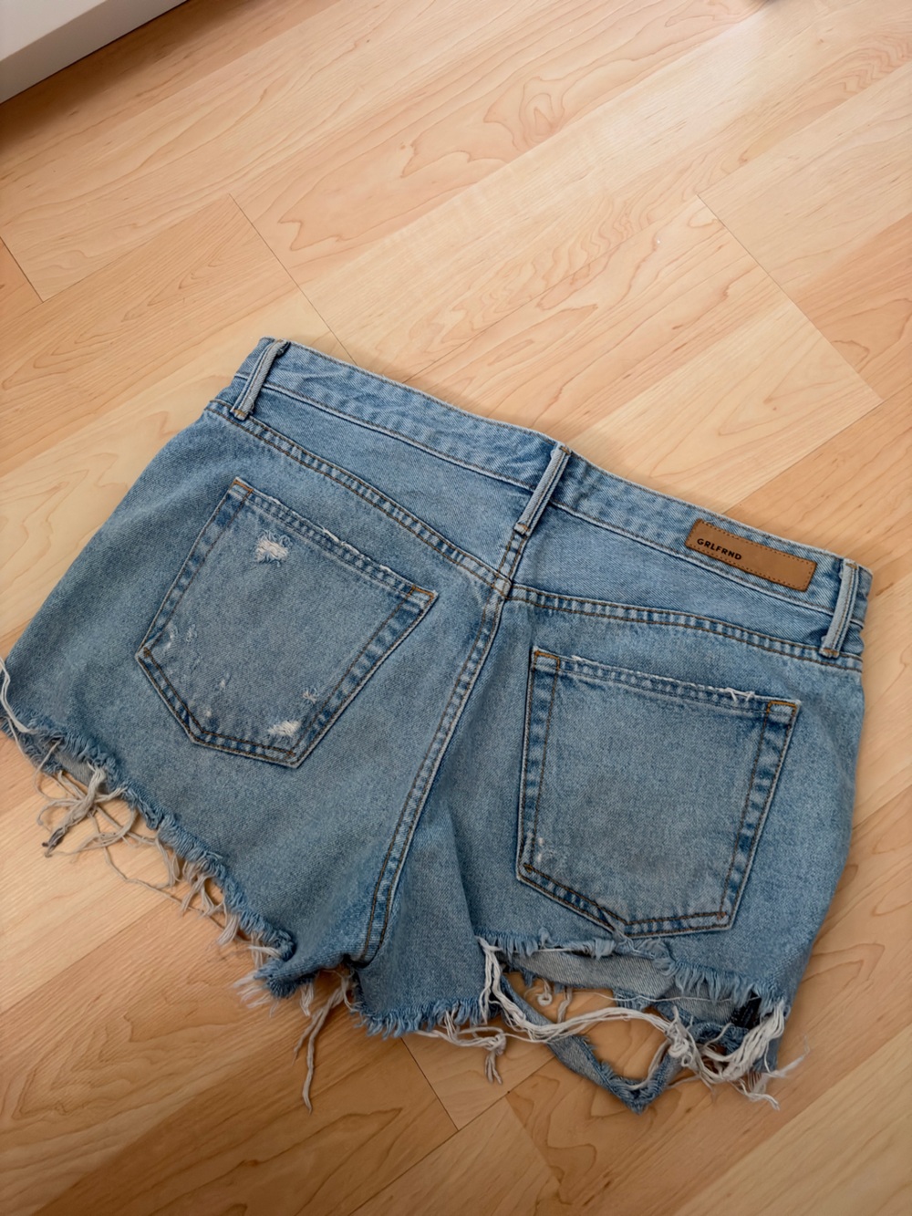 GRLFRND Light Blue Distressed Frayed Hem Denim Shorts